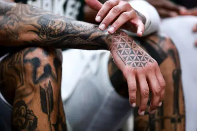 New Study Finds Tattoo Ink Moves Through Body, Kills Immune Cells