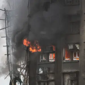 ‘No Alarm Went Off’: Hong Kong Fire Survivor Recounts Harrowing Escape