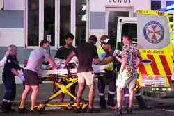 Bystander hailed as a hero for disarming Sydney gunman