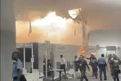 Fire prompts evacuations at U.N. climate talks in Brazil; 13 suffer smoke inhalation