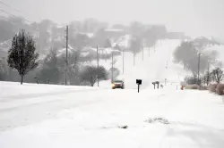 A major winter storm disrupts travel as millions head home after Thanksgiving